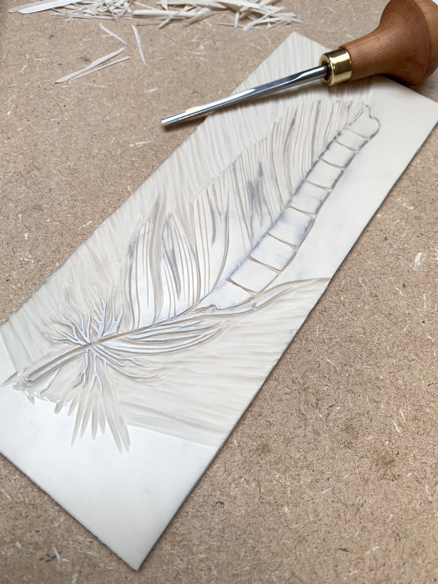 lino and lino cutting tool used to make the Jay feather card