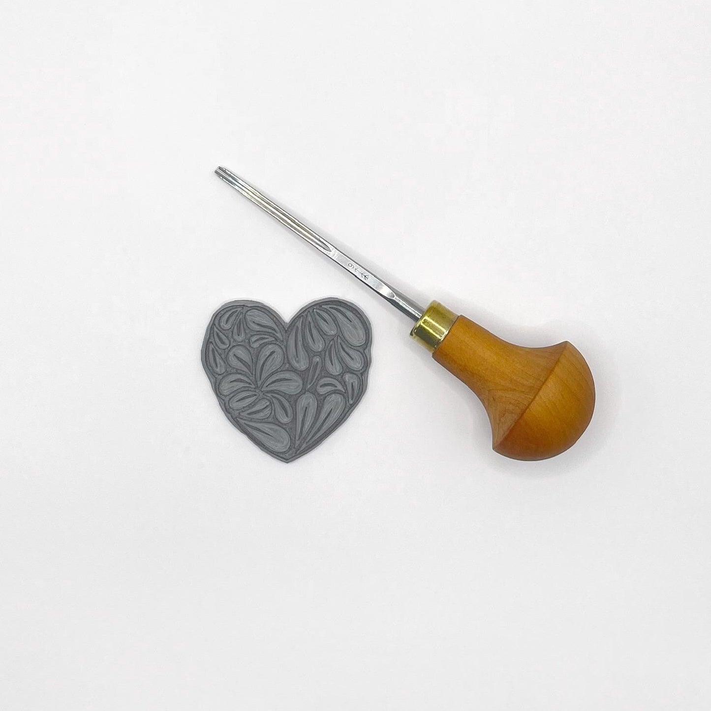 Lino and cutting tool used to make the notebook.